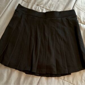 Pink. Pleated Tennis Skort. Black.